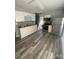 Bright kitchen featuring stainless steel appliances, white cabinets, and a stylish backsplash at 131 Mays Ct, Rock Hill, SC 29730