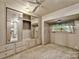 Bedroom with carpeted floors, a ceiling fan, mirrored closet doors and natural light at 132 Larboard Trl, Mount Gilead, NC 27306