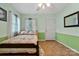 Inviting bedroom with natural light, ceiling fan, and neutral decor, a relaxing retreat at 132 Larboard Trl, Mount Gilead, NC 27306
