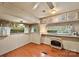 Bright dining area with hardwood floors, classic light fixture and plenty of natural light at 132 Larboard Trl, Mount Gilead, NC 27306
