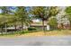 Well-kept property featuring mature trees and multiple structures, a picturesque setting at 132 Larboard Trl, Mount Gilead, NC 27306