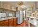 Functional kitchen with ample counter space, hardwood floors and access to the living room at 132 Larboard Trl, Mount Gilead, NC 27306