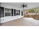 Spacious porch with ceiling fan, windows, and access to the outdoors at 132 Larboard Trl, Mount Gilead, NC 27306