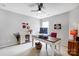 Functional home office space with a large desk and stylish decor at 13610 Aldenbrook Dr, Huntersville, NC 28078
