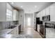 Clean kitchen with granite counters, stainless steel appliances, and white cabinetry at 13610 Aldenbrook Dr, Huntersville, NC 28078