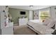 Light and airy bedroom with modern furnishings and a view to the outside at 151 Brown Farms Dr, Cleveland, NC 27013