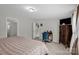Comfortable bedroom featuring plush carpeting, a workspace, and warm natural light at 151 Brown Farms Dr, Cleveland, NC 27013