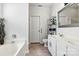 Clean bathroom featuring a double vanity sink, large mirror, and decorative elements for added appeal at 158 Bluffton Rd, Mooresville, NC 28115