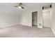 Spacious bonus room with plush carpeting and easy access to additional storage areas providing versatile space at 158 Bluffton Rd, Mooresville, NC 28115