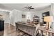Spacious living room with hardwood floors, a ceiling fan, and a cozy seating arrangement at 158 Bluffton Rd, Mooresville, NC 28115