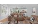 Open-concept living room seamlessly flows into the dining and kitchen areas at 1614 Crestgate Dr, Waxhaw, NC 28173