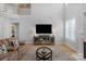 Spacious living room with a fireplace, and a view of the upstairs landing at 1614 Crestgate Dr, Waxhaw, NC 28173