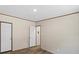 Bedroom featuring neutral walls, plank flooring, and white trim at 1649 Cloudburst Cir # 6, Lincolnton, NC 28092
