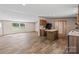 Open-concept kitchen and living area with stylish countertops, appliances, and modern flooring at 1649 Cloudburst Cir # 6, Lincolnton, NC 28092