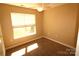 Clean bedroom features neutral walls, carpet, and a window at 2043 Shady Pond Dr, Clover, SC 29710
