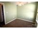 Simple bedroom featuring neutral walls, carpet, and a ceiling fan at 2043 Shady Pond Dr, Clover, SC 29710