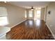 Open-concept living room with hardwood floors, plenty of natural light, and seamless transition to other spaces at 2043 Shady Pond Dr, Clover, SC 29710