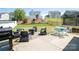 The backyard has a spacious patio area with seating, ideal for enjoying outdoor gatherings at 2207 Atwell Glen Ln, Pineville, NC 28134