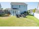 Spacious backyard with a patio area, perfect for outdoor entertaining and relaxation at 2207 Atwell Glen Ln, Pineville, NC 28134