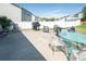 A spacious backyard patio includes a grill, seating, and ample space for outdoor relaxation at 2207 Atwell Glen Ln, Pineville, NC 28134