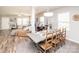 Bright dining room and partial living area, perfect for entertaining and Gathering gatherings at 2207 Atwell Glen Ln, Pineville, NC 28134