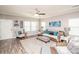 Bright and inviting living room with comfortable seating, decorative accents, and modern flooring at 2207 Atwell Glen Ln, Pineville, NC 28134