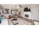 Cozy living room featuring a fireplace, mounted TV, and comfortable seating area at 2207 Atwell Glen Ln, Pineville, NC 28134