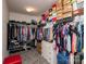 Large walk-in closet with ample storage space for clothes, shoes, and accessories at 2207 Atwell Glen Ln, Pineville, NC 28134