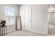 Bright bedroom with a full-length mirror, neutral walls, and comfortable carpet at 228 Brownstone Dr, Rock Hill, SC 29730