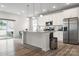 Well-lit kitchen features white cabinetry, stainless steel appliances, and granite countertops at 228 Brownstone Dr, Rock Hill, SC 29730