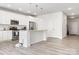 Spacious kitchen with white cabinets, stainless steel appliances, and a large center island at 228 Brownstone Dr, Rock Hill, SC 29730
