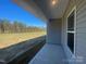 Covered back porch with an expansive backyard and view at 228 Mountain Island Dr # 38, Statesville, NC 28677