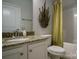 Bathroom with granite countertop vanity, decorative accents, and tub-shower combo, offering style and functionality at 228 Mountain Island Dr # 38, Statesville, NC 28677