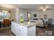 Open-concept kitchen with granite island overlooking the living area, perfect for entertaining and Gathering time at 228 Mountain Island Dr # 38, Statesville, NC 28677