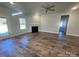 Spacious living room features a fireplace, ceiling fan, and plenty of natural light at 228 Mountain Island Dr # 38, Statesville, NC 28677