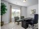 Well-lit office space with a neutral color palette, a large window, and professional furnishings at 228 Mountain Island Dr # 38, Statesville, NC 28677