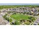 An aerial view showcasing the meticulously manicured lawns and tree-lined streets throughout this neighborhood at 2311 Lochview St, Pineville, NC 28134