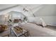 Spacious bonus room with ample seating, a teepee, and neutral colors at 2311 Lochview St, Pineville, NC 28134