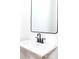 Modern bathroom features a white vanity with black hardware and an unframed mirror at 2501 Elon St, Charlotte, NC 28208