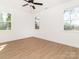 Bright, airy bedroom with ample natural light and wood flooring at 2501 Elon St, Charlotte, NC 28208