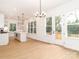 Open living space flows to the light-filled kitchen and features access to the outdoor deck at 2501 Elon St, Charlotte, NC 28208