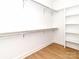 Spacious walk-in closet with custom shelving, and ample storage space for organization at 2501 Elon St, Charlotte, NC 28208