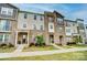 Charming townhome showcasing a combination of stone and neutral siding at 2533 Ensemble Ct, Charlotte, NC 28262