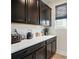 Modern kitchen with black cabinets, white countertops, and stainless steel appliances, creating a stylish cooking space at 2533 Ensemble Ct, Charlotte, NC 28262