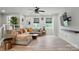 Spacious living room with modern flooring, ample seating, and natural light at 2533 Ensemble Ct, Charlotte, NC 28262