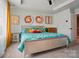 Bright main bedroom featuring a tray ceiling, modern decor and natural lighting at 2533 Ensemble Ct, Charlotte, NC 28262