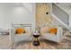 Cozy sitting area with stylish chairs, unique decor, and modern flooring at 2533 Ensemble Ct, Charlotte, NC 28262