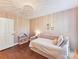 bedroom with a white crib, overhead light fixture and warm wall color at 2621 Huntman Way, Charlotte, NC 28226
