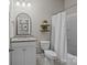 Bathroom with white vanity and large mirror at 291 Preston Rd, Mooresville, NC 28117