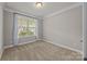 Bedroom with natural light and neutral paint at 291 Preston Rd, Mooresville, NC 28117